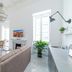 Carmelita Valletta in Valletta, bright suite with chandelier, fireplace, dining area and potted plant