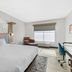 Best Western Plus Rose City Conference Center Inn room in Thomasville with king bed, desk and window seating