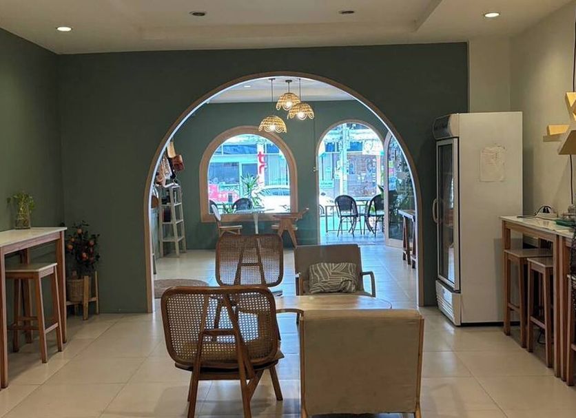 Sleep At Phuket Sha Plus lobby lounge with arched opening and seating in Phuket City