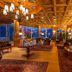 Grand Hotel Zell am See in Zell am See lounge with chandeliers, arched windows and lake views