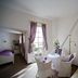Hotel Goldener Hecht Heidelberg room with twin beds, round table, and balcony doors