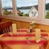 Flairhotel am Wörthersee in Velden am Wörthersee with lake view from a dining table