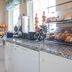 Ramada by Wyndham 100 Mile House breakfast area with pastries, coffee station and granite counter