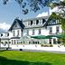Ilsington Country House Hotel & Spa in Newton Abbot, white country house hotel with lawn and garden