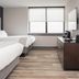 Haywood Park Hotel, Asheville: guest room with two beds, window and dresser