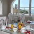 Hôtel Valencia in Hendaye dining room with sea view through arched windows