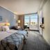 Isabella Island Hotel & Villas in Poreč guest room with twin beds and balcony sea view