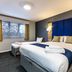 Days Inn by Wyndham London Stansted Airport room in Bishop's Stortford with king bed and window