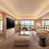 Conrad Singapore Orchard lounge with floor-to-ceiling windows and city views in Singapore