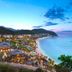 Mandarin Oriental, Sanya beachfront resort with ocean bay view at dusk