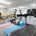 Microtel Inn & Suites by Wyndham Stockbridge/Atlanta I-75 gym with treadmill, weights, and exercise balls