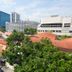 The Quay Hotel Bugis in Singapore, city view over red-roofed buildings and nearby high-rises