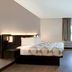 Studio 6 Pensacola, Fl- West I-10 room with king bed, desk, TV, window and curtain in Pensacola