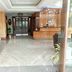 The Citi Inn, Jamshedpur hotel lobby with reception desk and glass entry doors