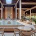 Grand Palladium Bavaro Suites Resort & Spa Punta Cana indoor pool and lounge seating under high ceilings