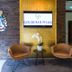 Hotel & Restaurant Goldener Pflug lobby seating area with sign in Ludwigsburg