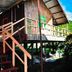 Kinabalu Poring Vacation Lodge in Kundasang: wooden stilt cabin with raised stairs and porch