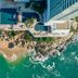 Fiesta Americana Acapulco Villas in Acapulco, aerial view of beachfront pools and rocky shoreline