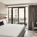 AC Hotels by Marriott San Diego Downtown Gaslamp Quarter room with balcony view and TV in San Diego