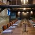 Hotel du Vin Henley meeting room in Henley-on-Thames with long conference table and leather chairs