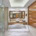 Real Madrid Holiday Island Style Hotel (Haikou Qilou Old Street), Haikou bathroom with glass shower and vanity