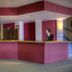 Lecadin Hotel in Karpenísi reception desk with stone wall and staircase