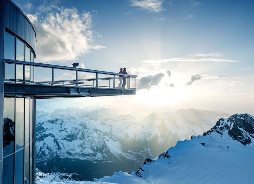 Avenida Panorama Suites in Kaprun with glass balcony and panoramic snowy mountain views