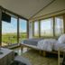 Viewtower Resort in Jeju City room with floor-to-ceiling windows overlooking grassy fields