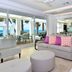 Coral Beach Club Villas & Marina in Upper Prince's Quarter living room with ocean-view balcony