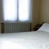 Hotel Meublè Adler room in Santa Caterina Valfurva with double bed and window