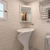 Agroturismo Ca Sa Vilda Marge bathroom in Sant Joan de Labritja with vessel sink, mirror and towel rack