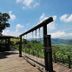 Shangrila Leisure Farm in Dongshan Township, scenic wooden walkway with mountain valley views