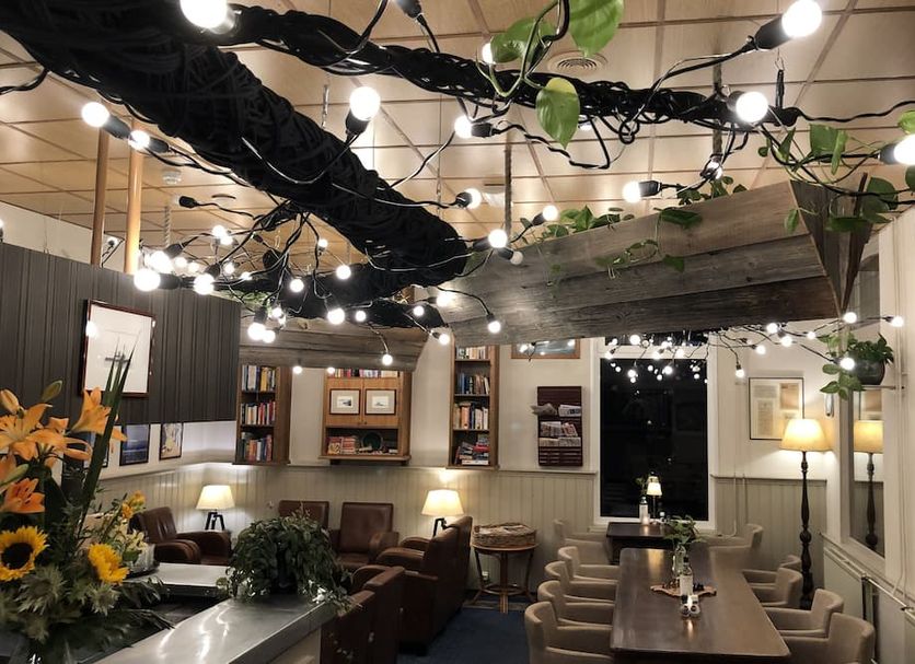 Hotel Nap in Terschelling dining room with hanging string lights and cozy seating