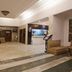 Hotel Chevron International lobby in Ludhiāna with seating area and front desk