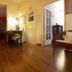 Il Riposo del Guerriero Guesthouse in Genoa hallway with wooden floors and desk area