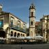 Aht Colonial Hostel in Havana beside a historic cathedral and arched plaza with outdoor seating