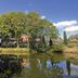 Best Western Manchester Bury Bolholt Country Park Hotel in Bury by a lake with tree reflections