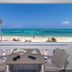 Hotel Bahia Sardina in San Andrés with balcony table overlooking a turquoise beach and ocean