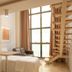 Hotel Habitare in Nova Friburgo: modern loft-style room with bed, seating area and staircase