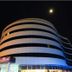 Golden Palas Hotel in Çerkezköy, curved modern facade at night with illuminated entrance