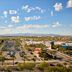 Renaissance Phoenix Glendale Hotel & Conference Center in Glendale with rooftop view of parking lot and mountains