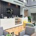 TIME Grand Plaza Hotel Dubai lobby lounge with reception desk, seating area, and café counter