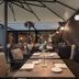 WorldHotel Casati 18 in Milan outdoor terrace dining area with covered seating and table settings