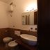Agriturismo Lapone bathroom in Orvieto with shower, toilet, bidet and vessel sink