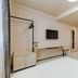 Jinjiang Inn (Huizhou Dadao Hefei) guest room in Hefei with TV, desk, open closet and bed