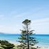 Cumberland Lorne Resort in Lorne with ocean views over a beach, grassy park, and coastline