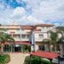 Park Hotel Tyrrenian in Amantea, exterior with palm trees, balconies, and a courtyard entrance