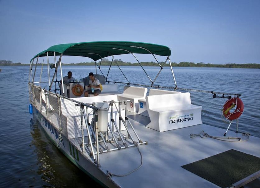 Bourbon Residence Barra da Tijuca - Rio de Janeiro pontoon boat on water with canopy and seating