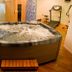 Alexandros Boutique Hotel in Náfplio spa room with indoor hot tub and exercise equipment