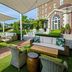 The Historic Cavalier Hotel and Beach Club, Autograph Collection patio seating in Virginia Beach with shaded canopy